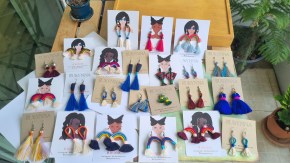 Tassel and rainbow earrings in Bangkok.